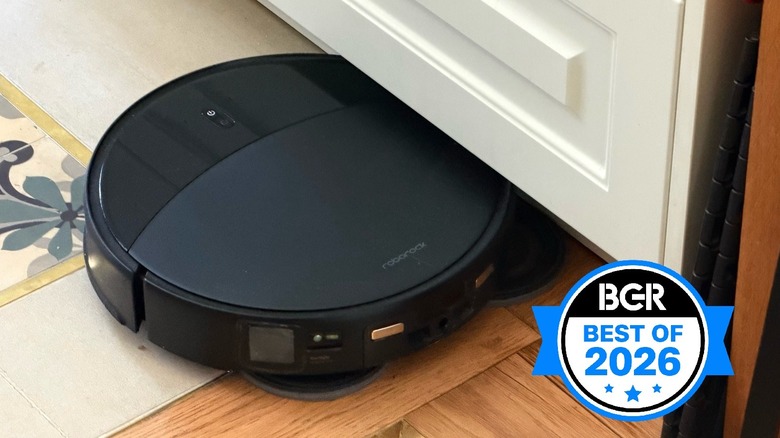 Roborock Saros 20 robot vacuum cleaning a hardwood floor.