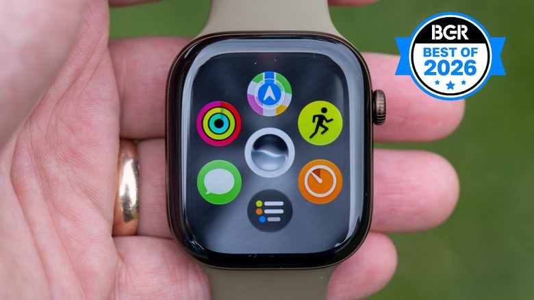 Apple Watch Series 12 powered on in someone's hand.