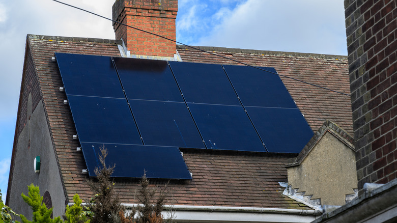 A house with solar panels installed on the roof