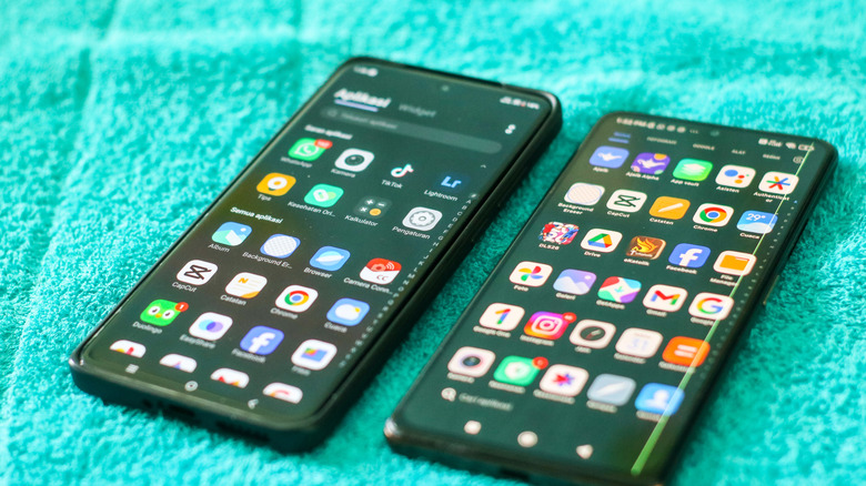 two android smartphones side by side with application icons
