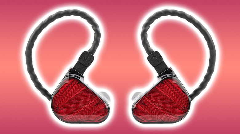 Pair of Zero Red IEM earbuds on a gradient background