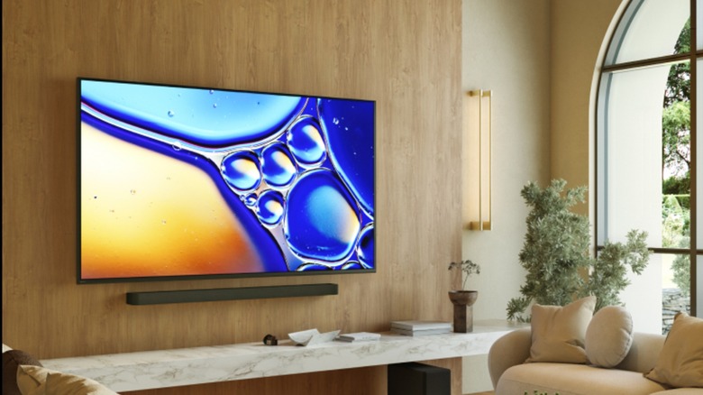 Sony Bravia TV mounted on a wooden wall