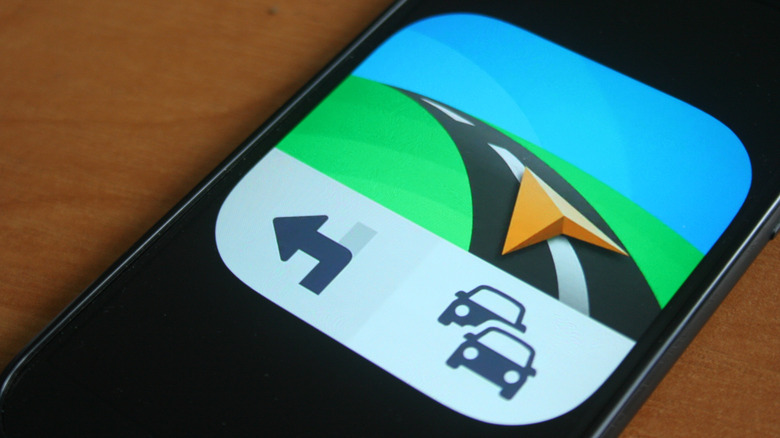 The Sygic app icon on a phone