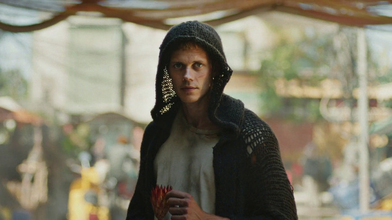 Boy (Bill Skarsgard) smiling while wearing a hood
