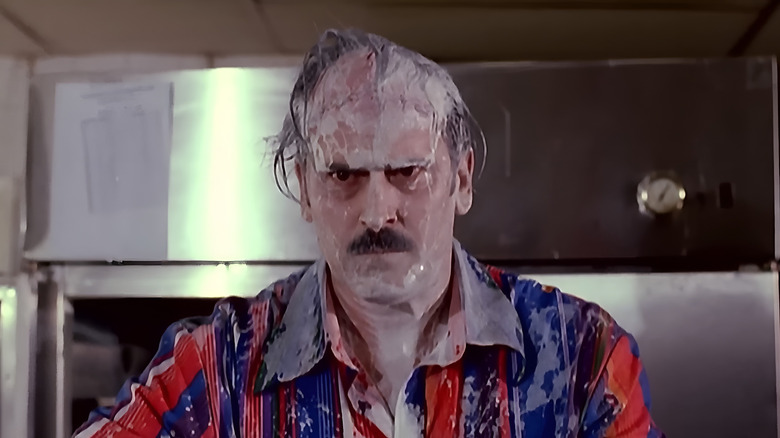 William (Bruce Campbell) covered in slime in 