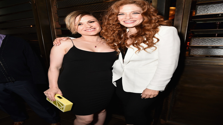 Anna Paquin and Rachel LeFevre smiling at premiere event