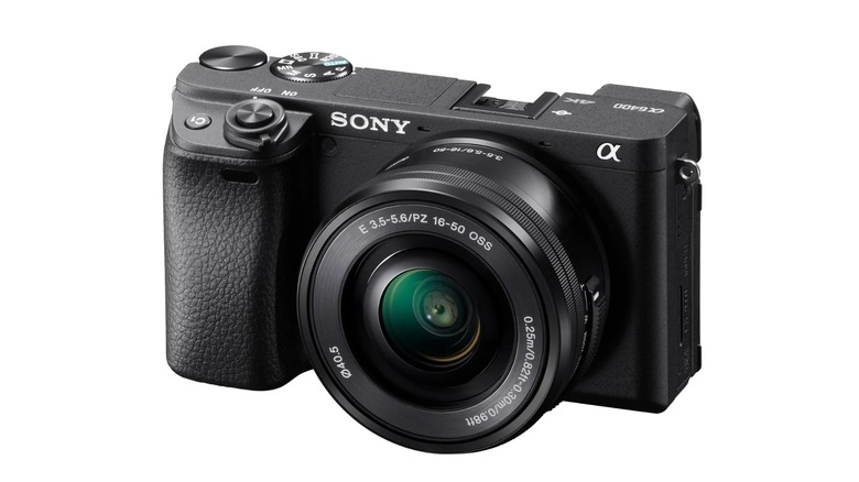 Sony a6400 mirrorless camera with a lens on a white background.