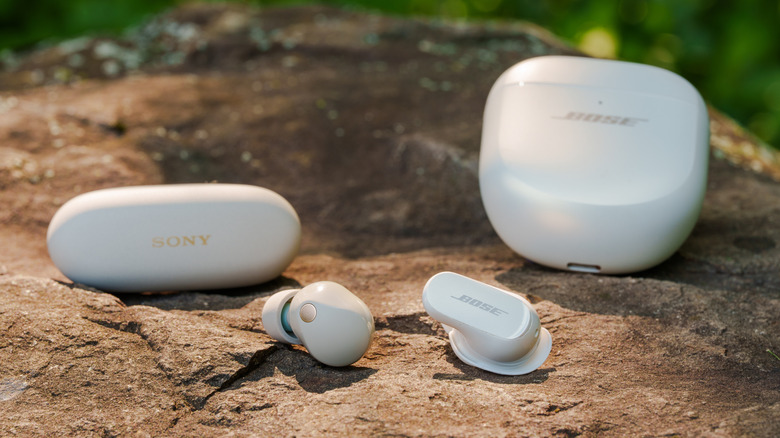 Bose QuietComfort Ultra earbuds alongside the Sony WF-1000XM5