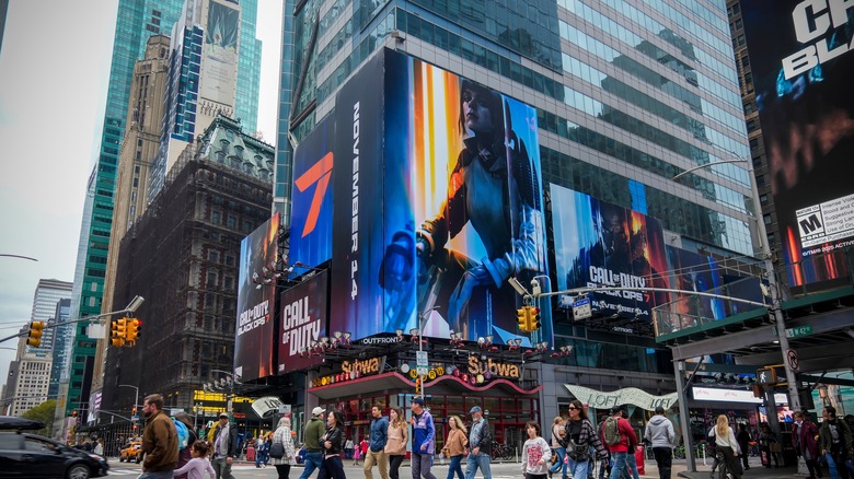 An advertisement for Call of Duty Black Ops 7 in Times Square, New York City.