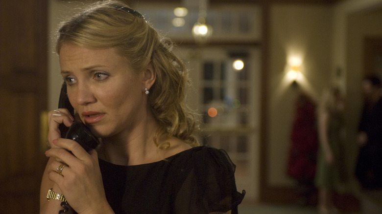 Norma Lewis on the phone, looking distressed