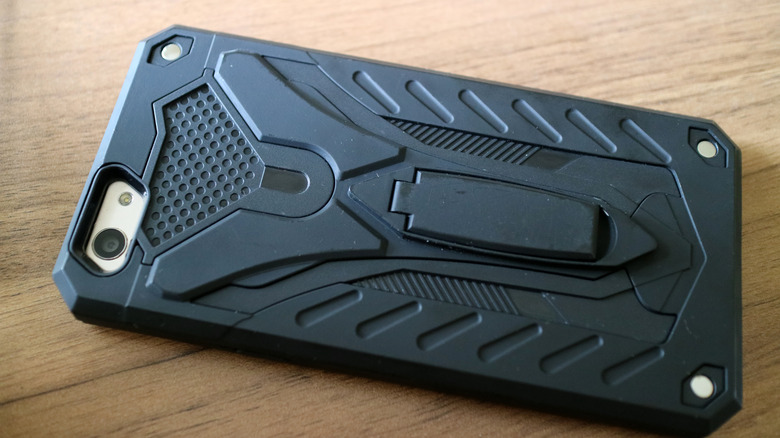 A smartphone with a bulky case.