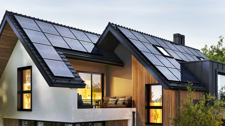 Close up of solar panels on the roof of a modern residential home.