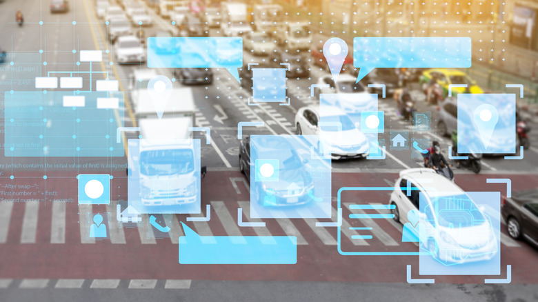 concept image of traffic cameras monitoring people's cars