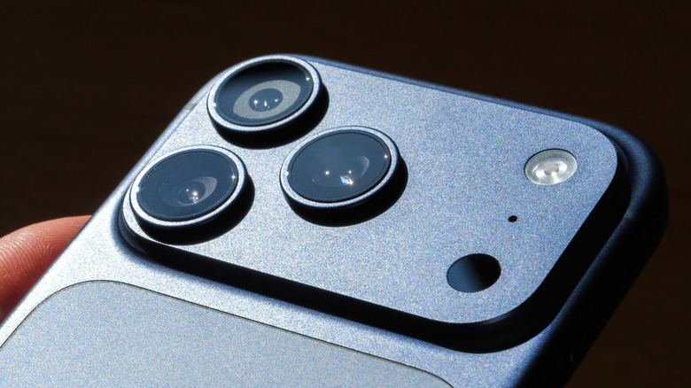 Close up view of a black iPhone 17 Pro's cameras