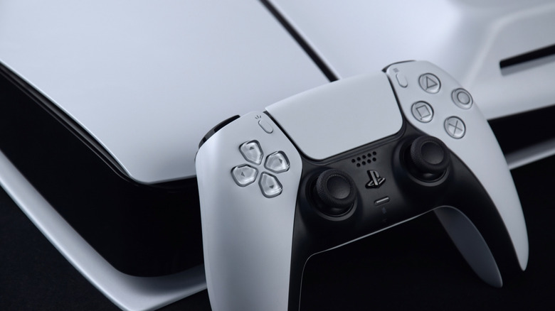 PlayStation 5 DualSense controller on top of a PS5