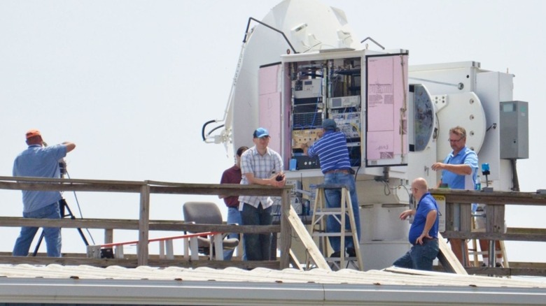 Lincoln Laboratory staff work on the Advanced Dynamic Aircraft Measurement System radars at Naval Air Station Patuxent River.