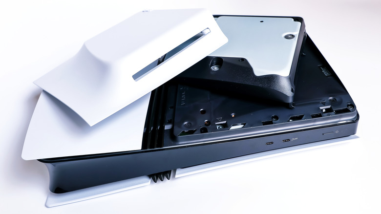 A PS5 Pro with the disc drive add being installed