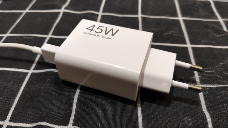 A white Xiaomi charger with a power rating of 45W, as shown on the label