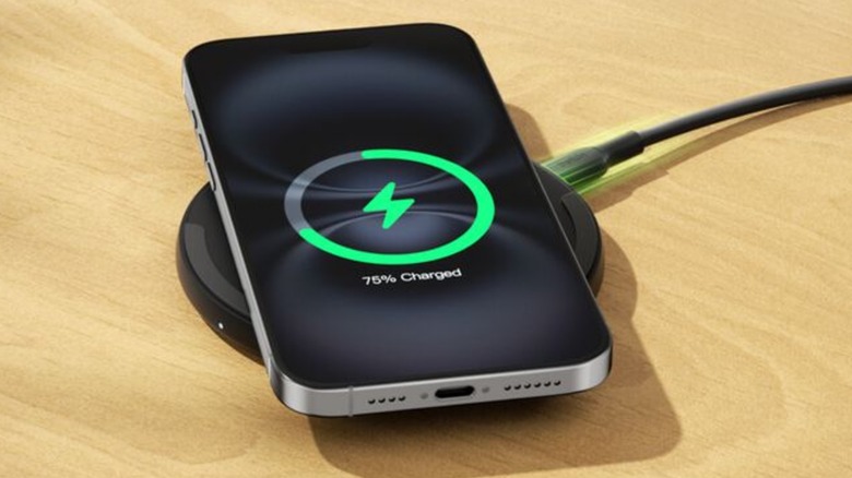 iPhone charging on a Belkin wireless charging pad