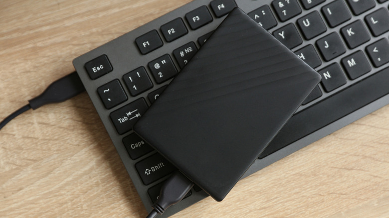An external drive plugged into a keyboard
