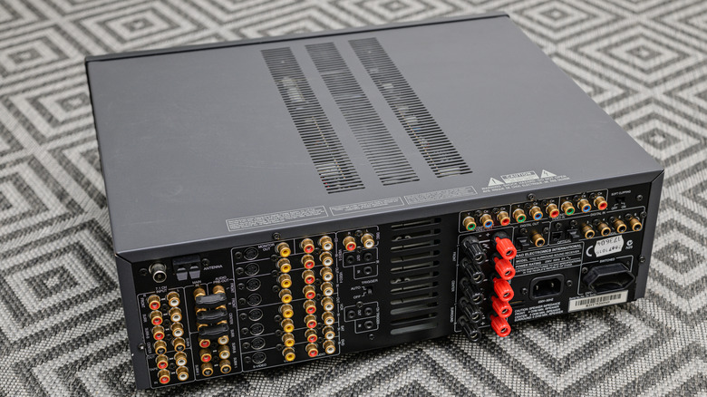 The inputs and outputs on the back of a large AV receiver.