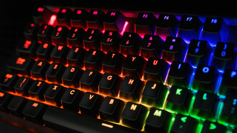Close-up of RGB mechanical keyboard with colorful backlit keys