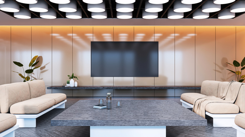 Corporate lounge with a TV on the wall