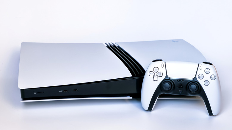 The PlayStation 5 Pro and DualSense controller are pictured against a white background.