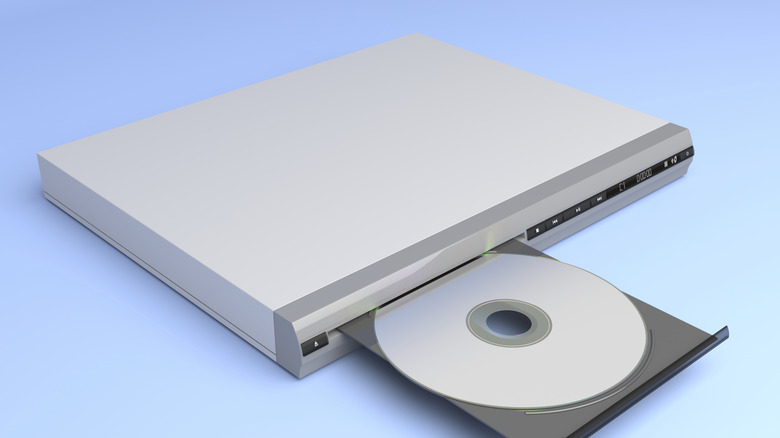 A DVD player with the disk tray open.