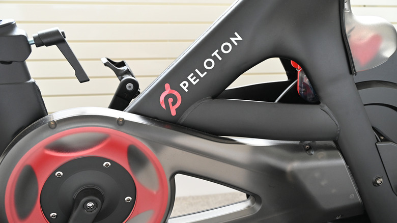 A close up of the Peloton logo on a Peloton Bike.