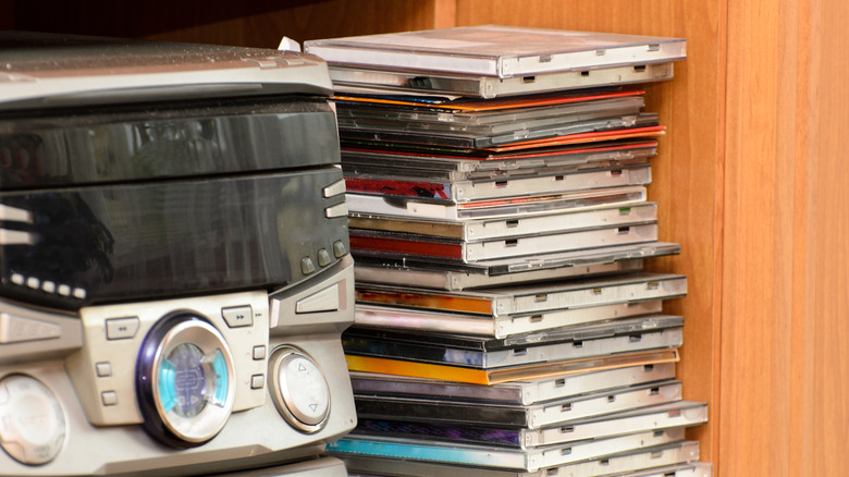Image showing a stereo and a stack of music CDs.
