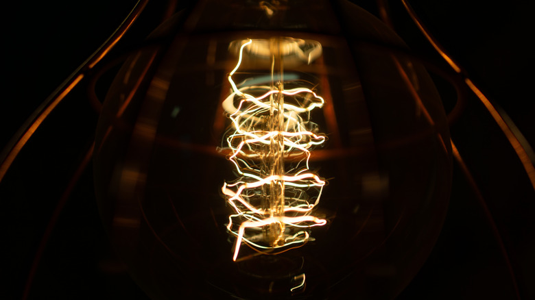Illuminated filament in a retro light bulb