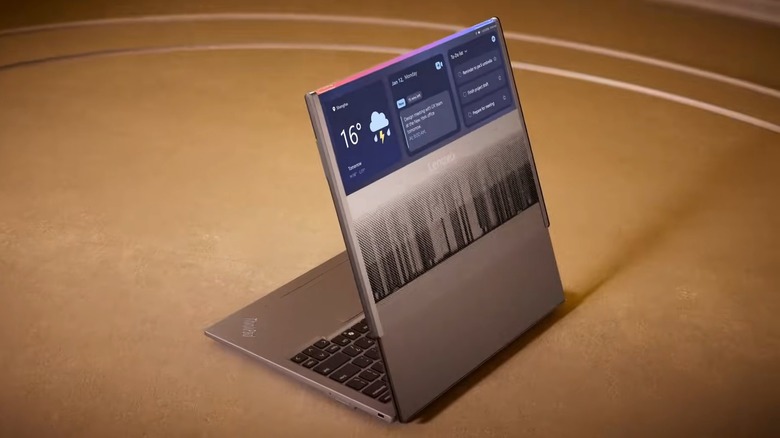 A screengrab from a promotional video for the Lenovo ThinkPad Rollable XD. The image shows the lid of the laptop extending vertically to provide consumers with a larger screen.