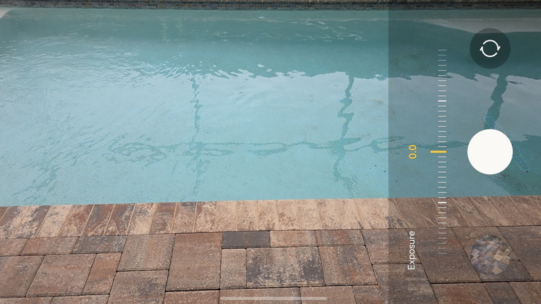 Samsung Galaxy camera with exposure settings visible.