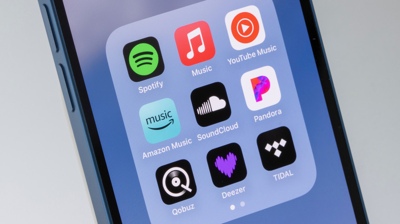 Several music streaming apps displayed on a phone screen.