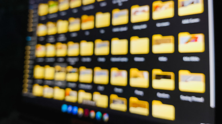 Computer screen with blurred file explorer open