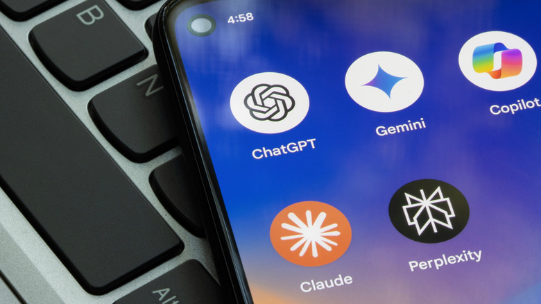 Smartphone with chatbot apps like ChatGPT and Claude