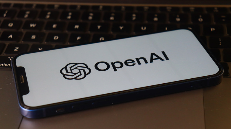 OpenAI logo on an iPhone screen
