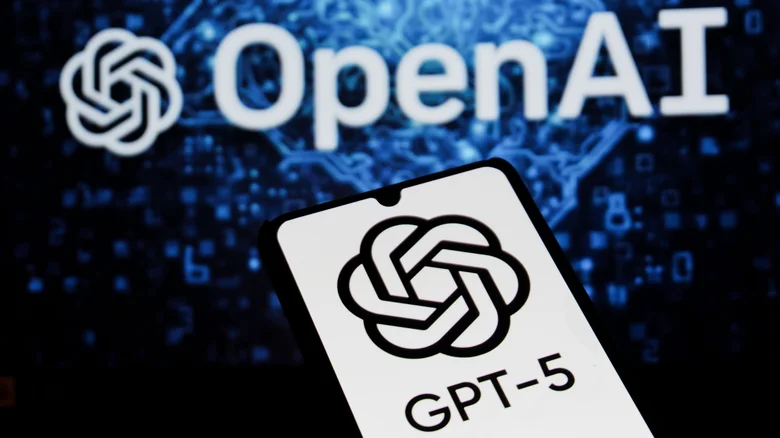 A photograph of a smartphone with the ChatGPT logo on the screen and the words "GPT-5" underneath the ChatGPT logo.