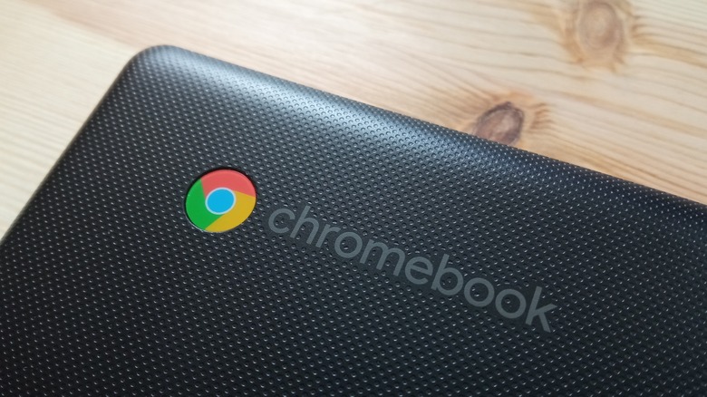 Close-up shot of the Chromebook logo on a laptop