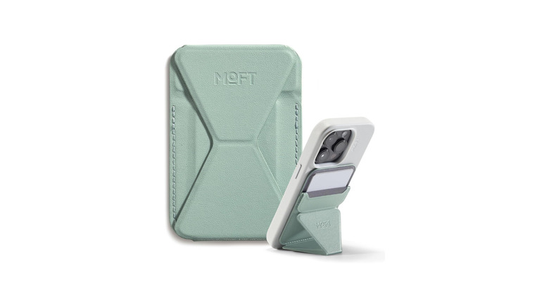 Seafoam green folding iPhone stand on white background