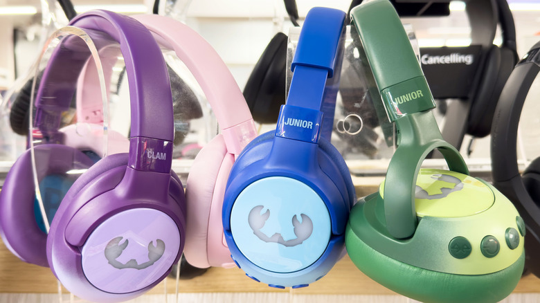 An array of colorful headphones on a display.