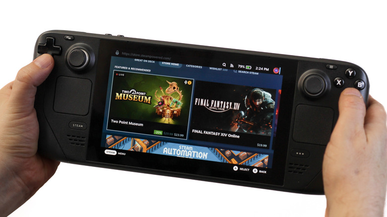 Steam Deck handheld gaming PC showing the Steam store while held in both hands.