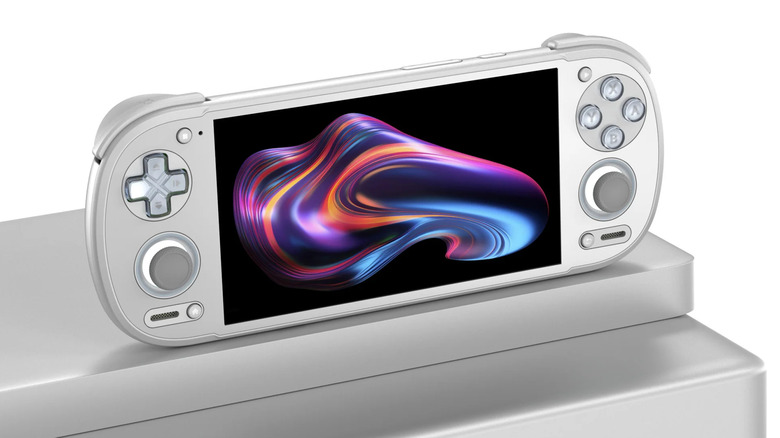 Retroid Pocket 6 handheld gaming device displayed on a silver stand with a colorful image on screen.