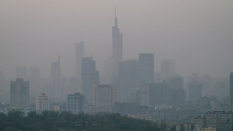 Dense air pollution visible in east Asian city.