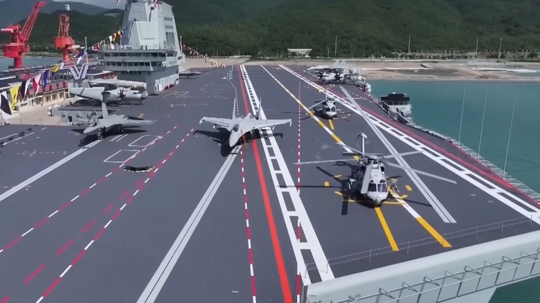 The Fujian aircraft carrier deck, with jets atop it.