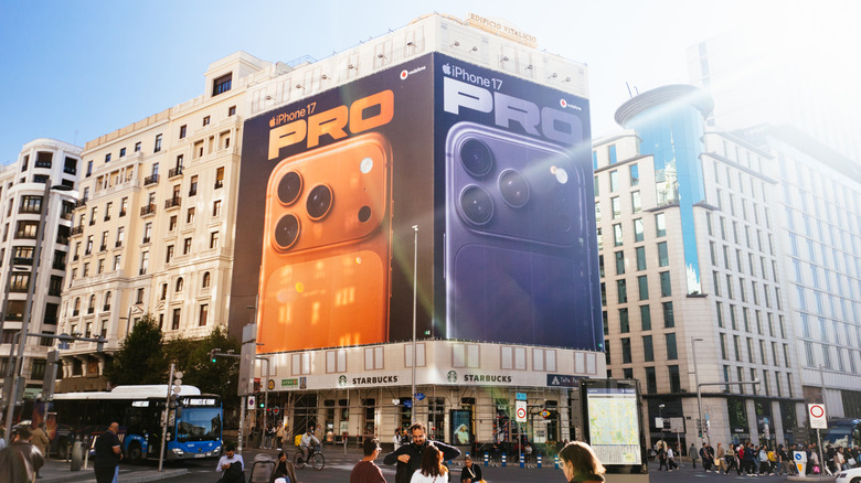 Billboards showing two of the three iPhone 17 Pro color options.