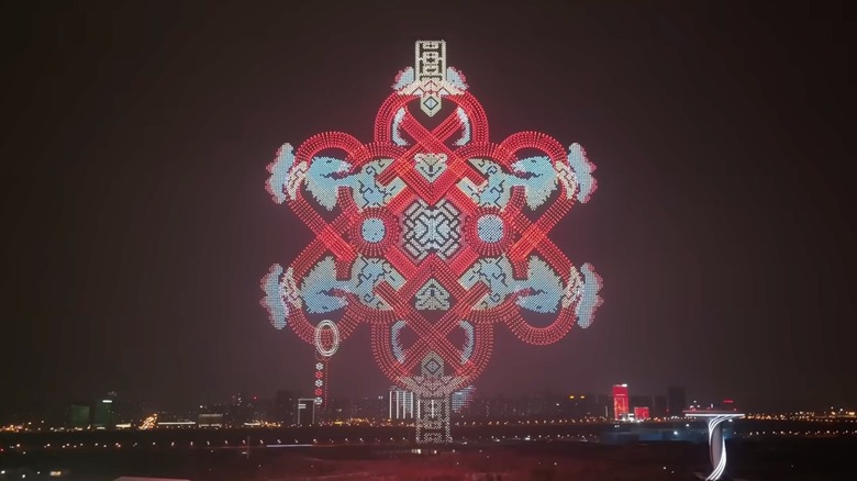 Over 22,000 drones taking to the night skies in China to help celebrate the Lunar New Year, the drones are in flying together to create a pattern of red and blues