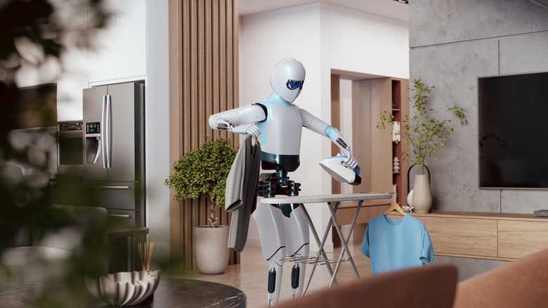 A concept humanoid robots ironing clothes.