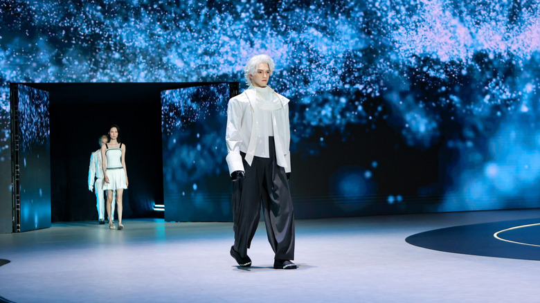 UBTech UWorld U1 Series human-like robot walking on stage.